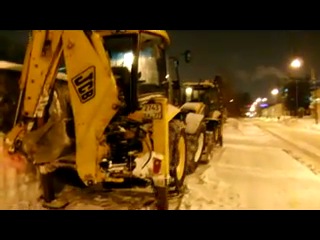 cleaning streets from snow in st. petersburg